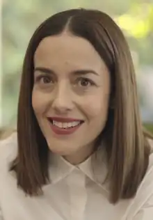 Image of actress Cecilia Suárez in a garden.