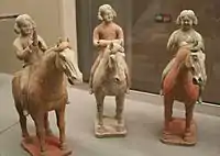 Tomb figures: three of eight lady musicians on horseback, early 8th century