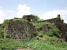 Stone fort, surrounded by grass