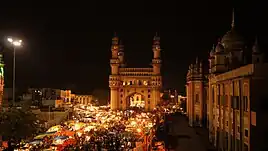 The Charminar designed in 1591 by the Shia scholar Mir Muhammad Momin, is located in Hyderabad, India.