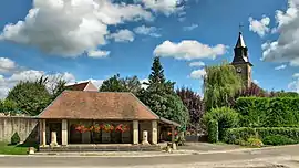 The wash house and church in Chaucenne