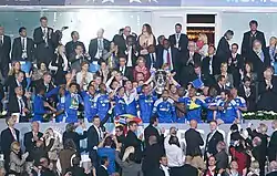 Chelsea received the trophy from UEFA President Michel Platini.