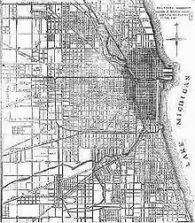 A streetmap of land adjacent to an area marked as Lake Michigan, with a central portion of the map shaded grey.