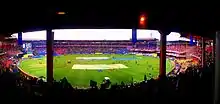 Fans cheering during an IPL match