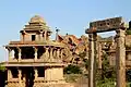 Ruins of temples and mandapa within the fort