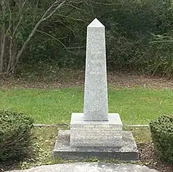 granite memorial dedicated in 1987 in Manorville, New York at the site of his 60-acre farm.