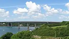 modern bridge spanning a broad river