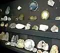 Minerals display, including coloured agates.