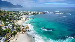 An aerial view of Clifton 4th (furthest out), 3rd, and 2nd beaches (closest to the foreground).