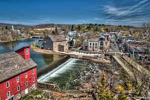 A view of Clinton, New Jersey with Red Mill (in the foreground) and the downtown district across the Raritan River (in the background)