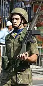 Cyprus National Guard soldier, wearing a blue ascot