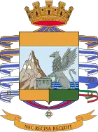 Coat of arms of the Guardia di Finanza, depicting the Cimon della Pala