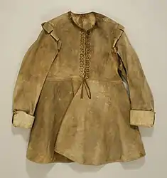 English buff coat 1630–1640 showing false fastening of silver tape down the front. Metropolitan Museum of Art