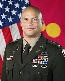 Col. Alain G. Fisher