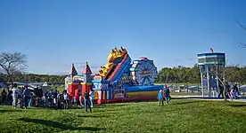 Inflatable at the College Park day with the airport in the back