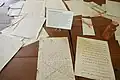 Papers representing notes and letters that would have been used during discussions