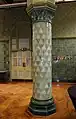 Faience column in the Chapel, Liverpool Royal infirmary, note the use of different shades of green to denote capital and base, also to subtly denote the plain and decorative tiles on the shaft