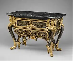 Baroque commode; by André Charles Boulle; c.1710-1732; walnut veneered with ebony and marquetry of engraved brass and tortoiseshell, gilt-bronze mounts, antique marble top; 87.6 x 128.3 x 62.9 cm; Metropolitan Museum of Art (New York City)