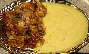 Polenta (right), with rabbit