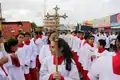 Female servers in a public procession