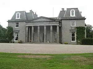 Photo of the front of mansion house