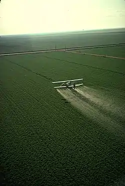 Cropduster spraying pesticides.