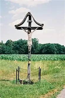 A Latin crucifix with a stylized INRI plaque attached, in cornfields near Mureck, Styria, Austria