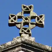 Four triquetras forming a "Carolingian cross" in the church of Santa Susanna in Galicia (11th/12th century[cite?]).