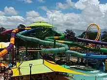 The slide tower housing The Temple of Huey and the Little Rippers is located within the footprint of Dreamworld's The Gold Coaster roller coaster.