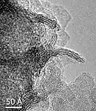 High-magnification transmission electron microscope (TEM) image of δ-MnO2 nano-crystals viewed parallel and perpendicular to the layer plane.