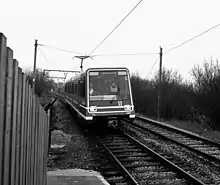 P86 stock fitted with pantograph (at Debdale Park, Manchester) during evaluation trials for a potential tram system in Manchester