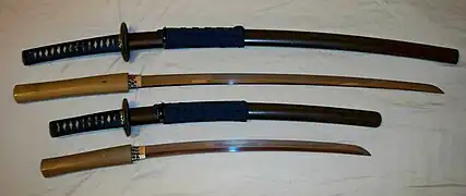 Antique Japanese (samurai) daisho, showing the matched set of mounts (koshirae).