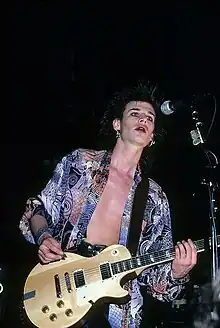 Ash on stage with Love and Rockets, c. 1989