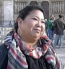 Woman in front of a cathedral