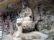 The Wisdom Queen Mahāmāyūrī surrounded by various devas, part of the Dazu Rock Carvings