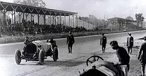 Ralph DePalma and Rupert Jeffkins, pushing the Mercedes down the main straightaway at the conclusion of the 1912 500-Mile Race.