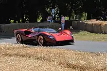 The De Tomaso P72 on the Goodwood hill climb course