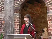 Carolyn Kreiter-Foronda participating in the Dead Poets Day event, held at the Edgar Allan Poe Museum in Richmond, VA in 2010.