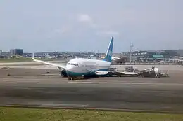 Grounded and badly damaged aircraft in an airport