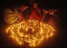 Homes, buildings and temples are decorated with festive lights, diya, for Diwali, the festival of lights.