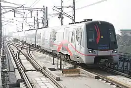 The outside of an Airport Express train, outdoors