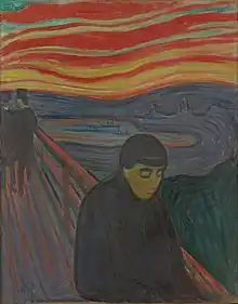 This is a painting featuring a figure standing on a bridge, gazing down, seemingly lost in thought. The background consists of a dramatic, swirling sky with striking red, yellow, and blue colors. The figure is dressed in dark clothing, and their posture and the expression on their face convey a sense of melancholy or introspection. The contrast between the vibrant sky and the subdued figure adds to the emotional impact of the scene. The artwork has an expressive, somewhat abstract style, characteristic of Edvard Munch's work.