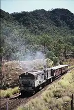 QR locos 1603 & 1634 climb the Razorback Range on the 'Last Train to Mt Morgan' tour, 1 August 1987