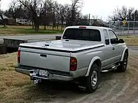 1998–2000 Tacoma rear(small "TOYOTA" in upper left corner with smooth tail light lenses)