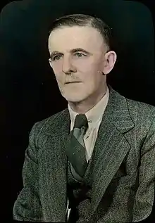 Colourized studio portrait of Diamond Jenness, circa 1950