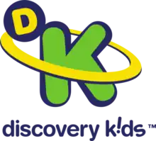 The logo of a Latin American children's TV channel, showing a green K circulated by a yellow ring with a blue D-sphere.