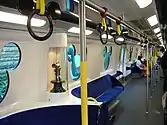 Inside the Disneyland Resort line MTR M-trains. The grab handles resemble Mickey Mouse.