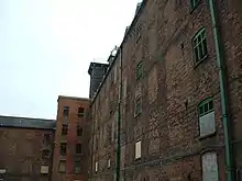 West side of the Main Mill c.2002 prior to restoration.