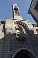 Entrance façade and bell tower of the church