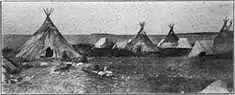 Tepees of the Dogrib First Nations on the shores of Slave Lake at Fort Resolution, circa 1907